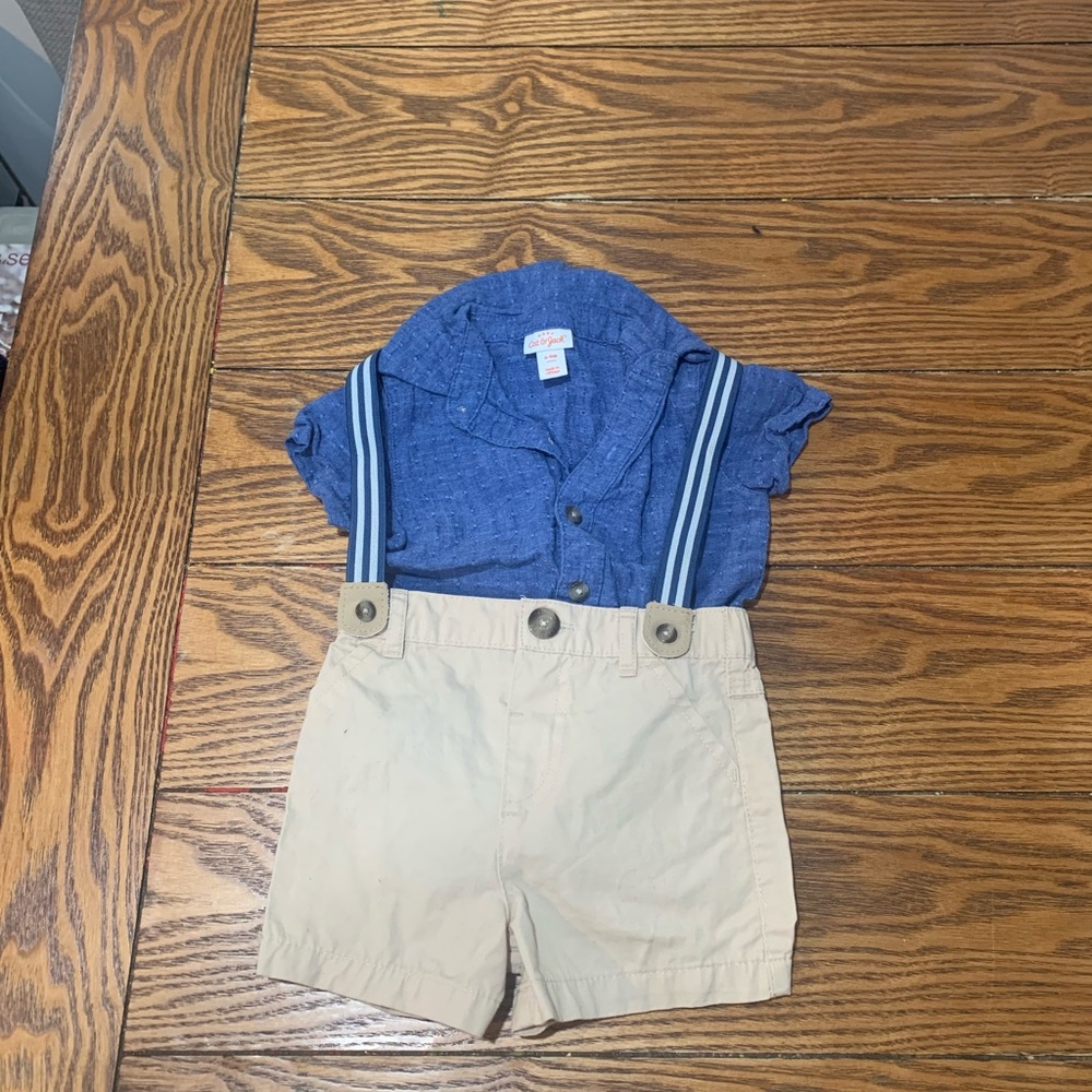 Shorts suspenders and a denim shirt